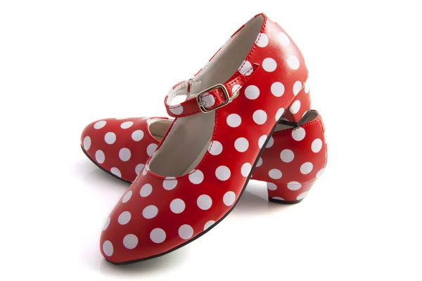 Spaanse spikkels rode witte schoenen — Stockfoto