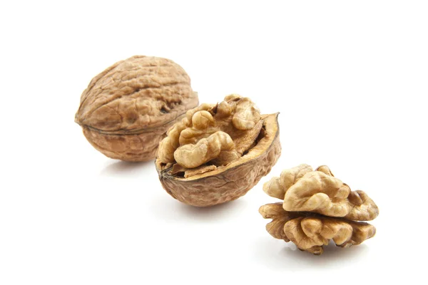 Walnut in a row — Stock Photo, Image