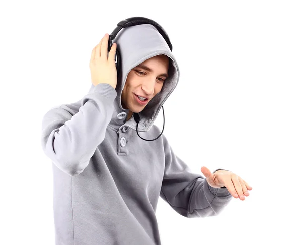 Retrato de un joven feliz escuchar música con auriculares —  Fotos de Stock