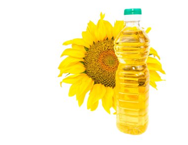 Blooming sunflowers and a bottle of vegetable oil clipart