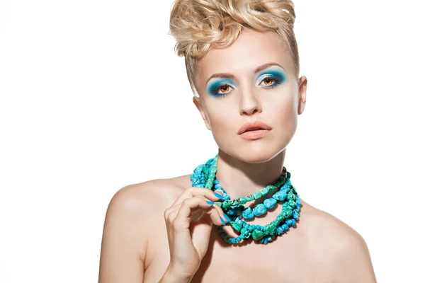 Beautiful sexy young woman with turquoise makeup and accessories — Stock Photo, Image