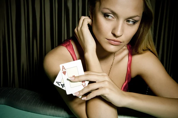 Sexy young girl in casino — Stock Photo, Image