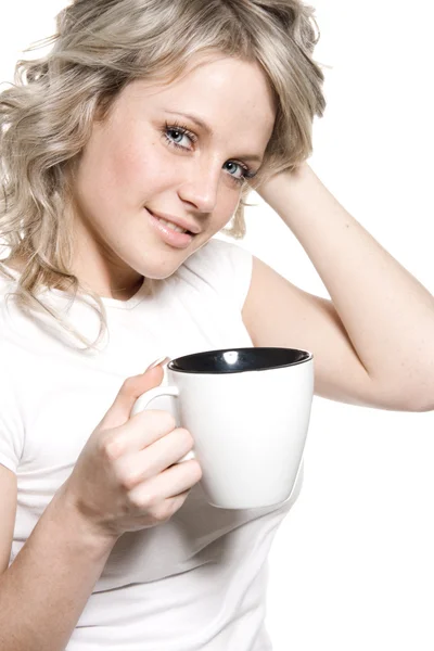 Menina encantadora com uma xícara de bebida quente — Fotografia de Stock