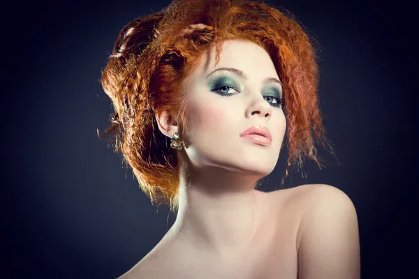 Face of a beautiful redhead woman with perfect makeup Royalty Free Stock Images