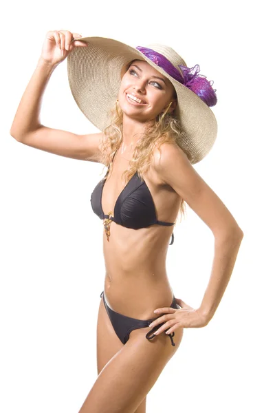 Όμορφη σέξι νεαρή ξανθιά γυναίκα στο μπικίνι και καπέλο που απομονώνονται σε — Φωτογραφία Αρχείου