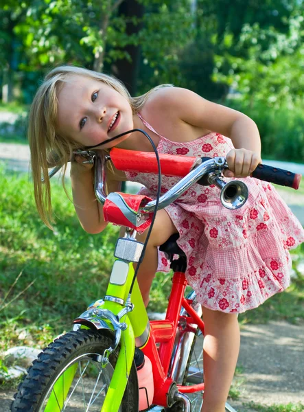 stock image Little girl and her bike