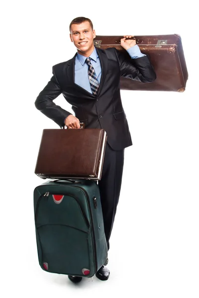 Ung affärsman med tre resväskor — Stockfoto