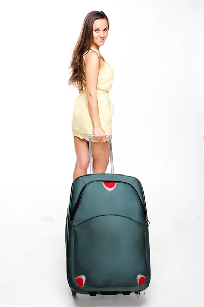 Девушка с чемоданом — стоковое фото