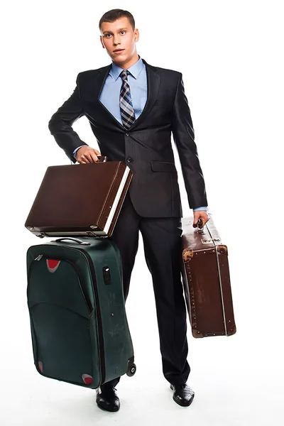 3 つのスーツケースを持った若いビジネスマン — ストック写真