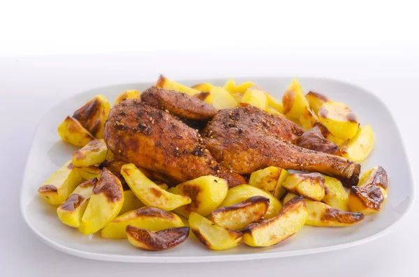 stock image Chickens roast with baking potatoes