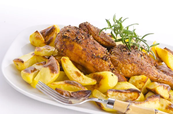 Stock image Chickens roast with baking potatoes