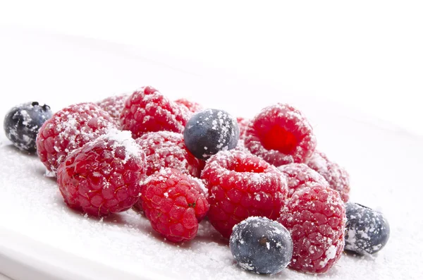 stock image Sugared raspberry and bilberry