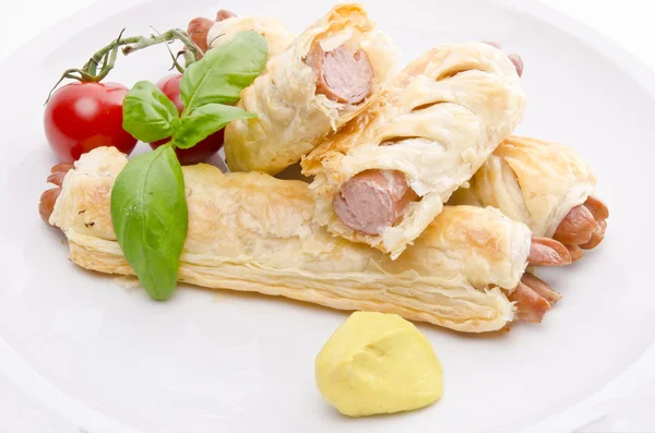 Frankfurter and puff pastry — Stock Photo, Image