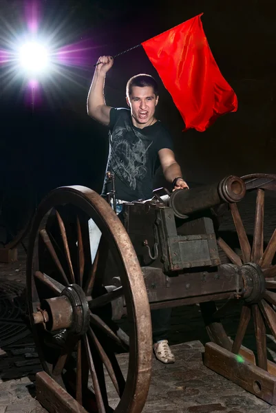 stock image Expressions Handsome man in funny shirt with flag in hand