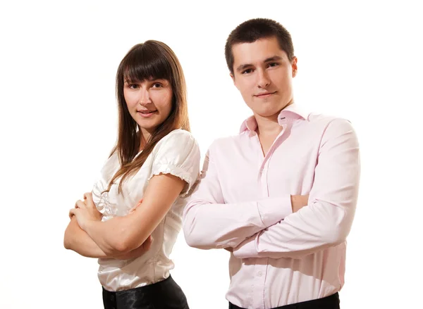 Ritratto di una allegra coppia d'affari in piedi insieme a braccia incrociate su sfondo bianco — Foto Stock