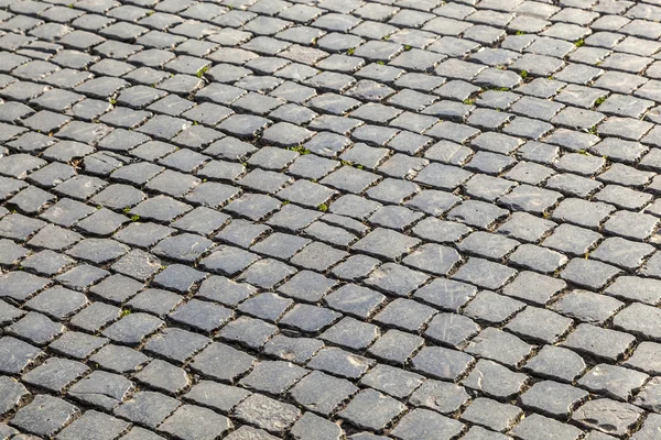 Старая мощеная каменная улица — стоковое фото