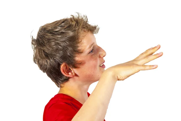 Смеющийся мальчик жестикулирует рукой — стоковое фото