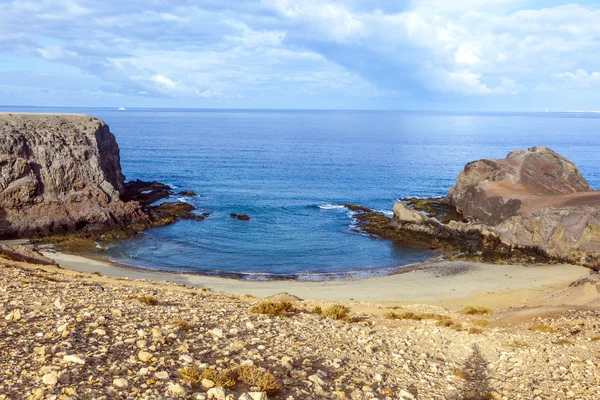 Pláž Playa de papagayo na lanzarote, Kanárské ostrovy, — Stock fotografie