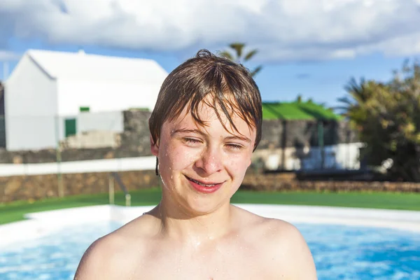 Boy swimming in the pool — Stock Photo, Image