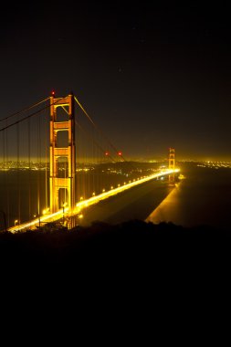 Famous golden Gate Bridge by night clipart