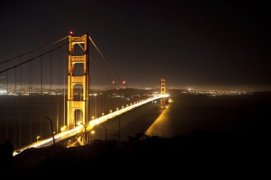 Famous golden Gate Bridge by night clipart