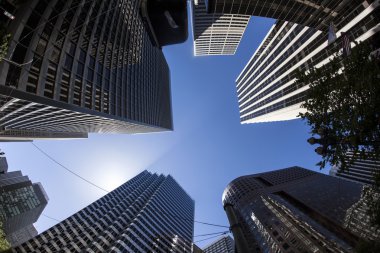 Skyscrapers downtown San Francisco in late afternoon clipart