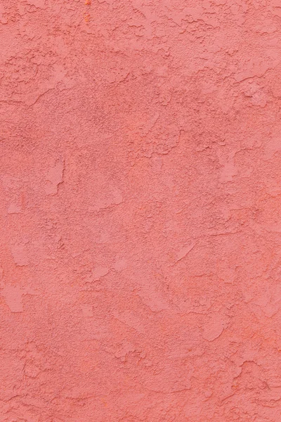 Red concrete wall with rough pattern