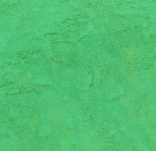 ラフのパターンを持つ緑のコンクリートの壁 — ストック写真