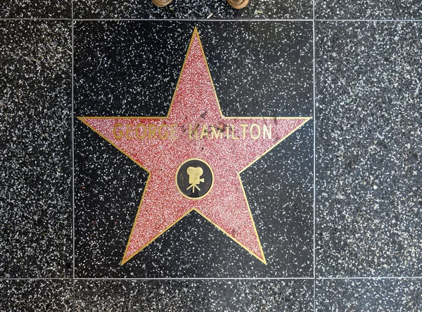 Джордж Гамільтон в зірка на Голлівудській алеї слави — стокове фото