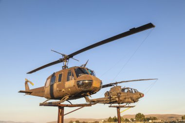 Helicopter at Veterans Memorial in Susanville under blue sky clipart