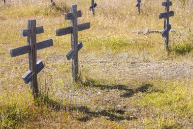 Old crosses at the historic orthodox cemetery of Fort Ross clipart