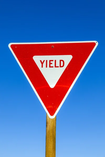 Yield Sign at the highway with blue sky — Stock Photo, Image