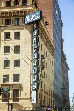 Neon letter at the facade of the famous SAN CARLOS hotel clipart