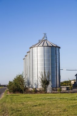 Field in harvest with silo clipart