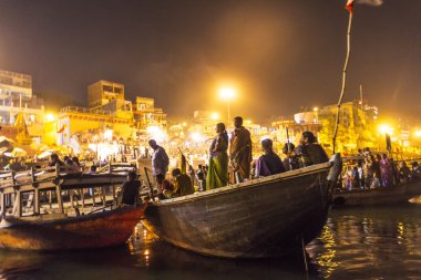 Night view of varanasi from the gange river, India. clipart
