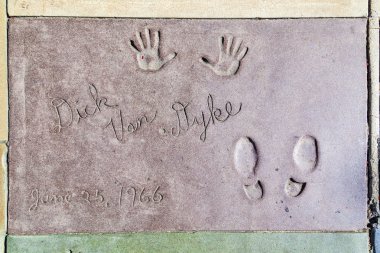 van Dykes handprints in Hollywood Boulevard in the concrete clipart