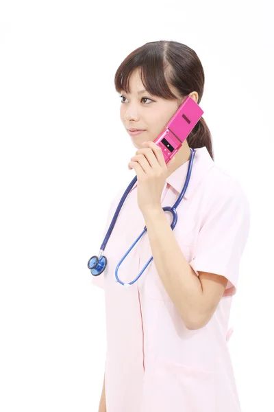Joven asiática enfermera — Foto de Stock