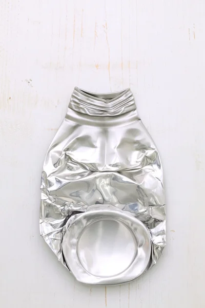 Crushed aluminum bottle — Stock Photo, Image