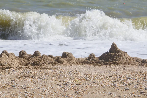 Sand castle on beach — Stock Photo, Image