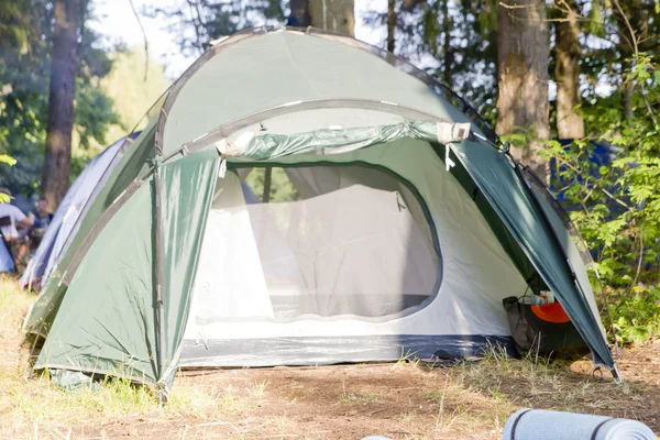 stock image Tent on grass in the forest