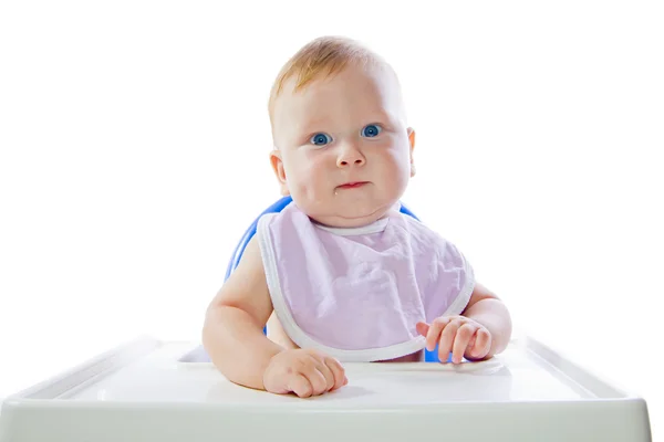 Ένα μικρό μπλε-eyed παιδί σίτιση πουρέ κολοκύθας — Φωτογραφία Αρχείου