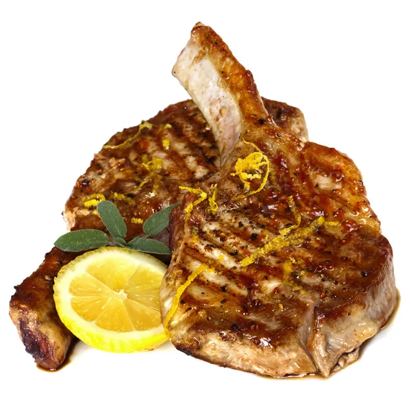 Gegrilde pork chops met salie en citroen over Wit — Stockfoto