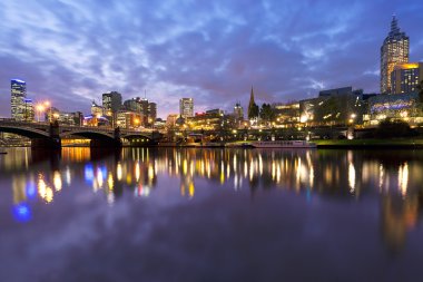 Melbourne, Australia, viewed over the Yarra River at dusk. clipart