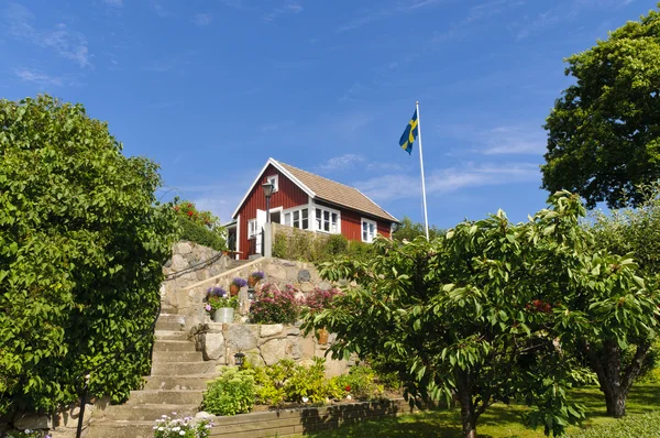 Stock image Red cottage in Sweden