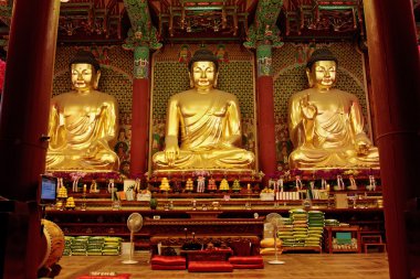 Golden Buddha in Jogyesa temple (Seoul) clipart