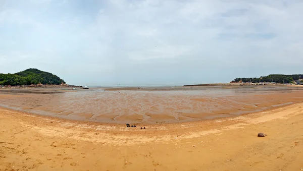 Ora della marea in spiaggia — Foto Stock