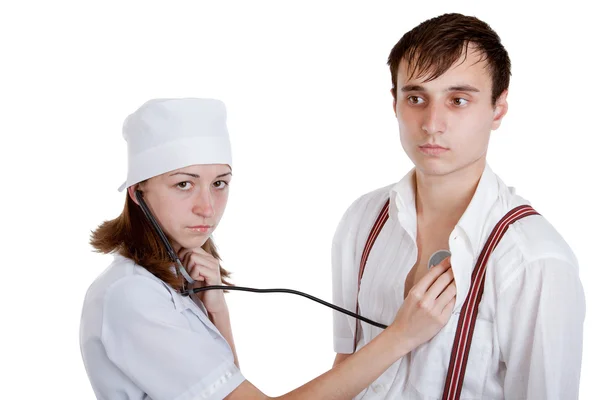 Lekarz badający pacjenta stetoskopem — Zdjęcie stockowe