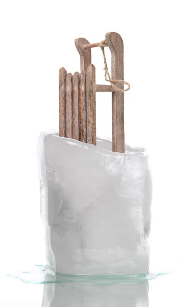 Old wooden sledge with rope captured in ice — Stock Photo, Image