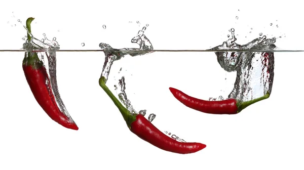 stock image Concept of red pepper in water