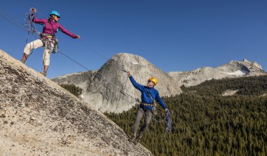 Climbers nearing the summit. clipart